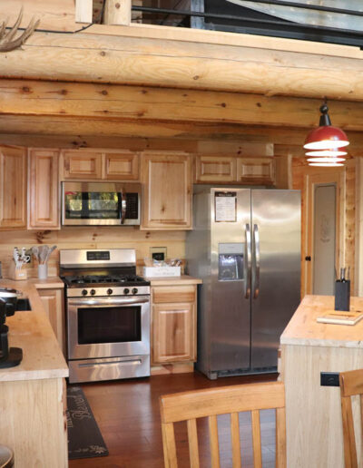 great room, wood burning fireplace, full kitchen, stove, coffee maker, refrigerator, northwoods cabin rentals, drone photographers, fvwd, things to do in upper michigan